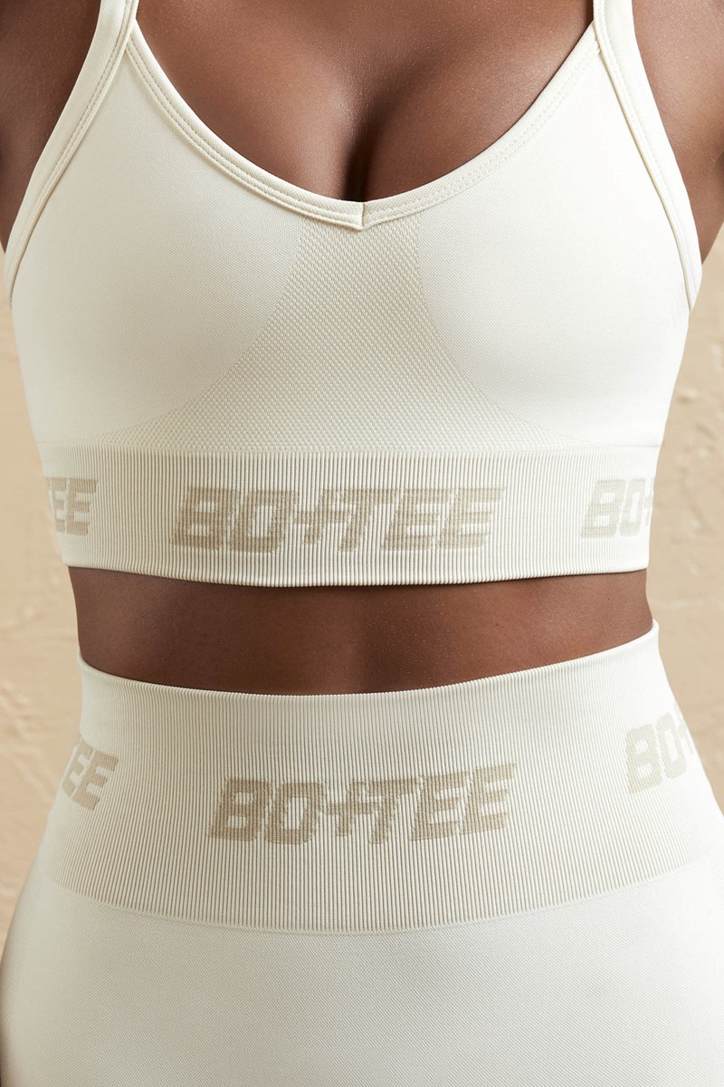 Bo+Tee Undefeated Cross Back Sports Bra Creme | CVKF85691